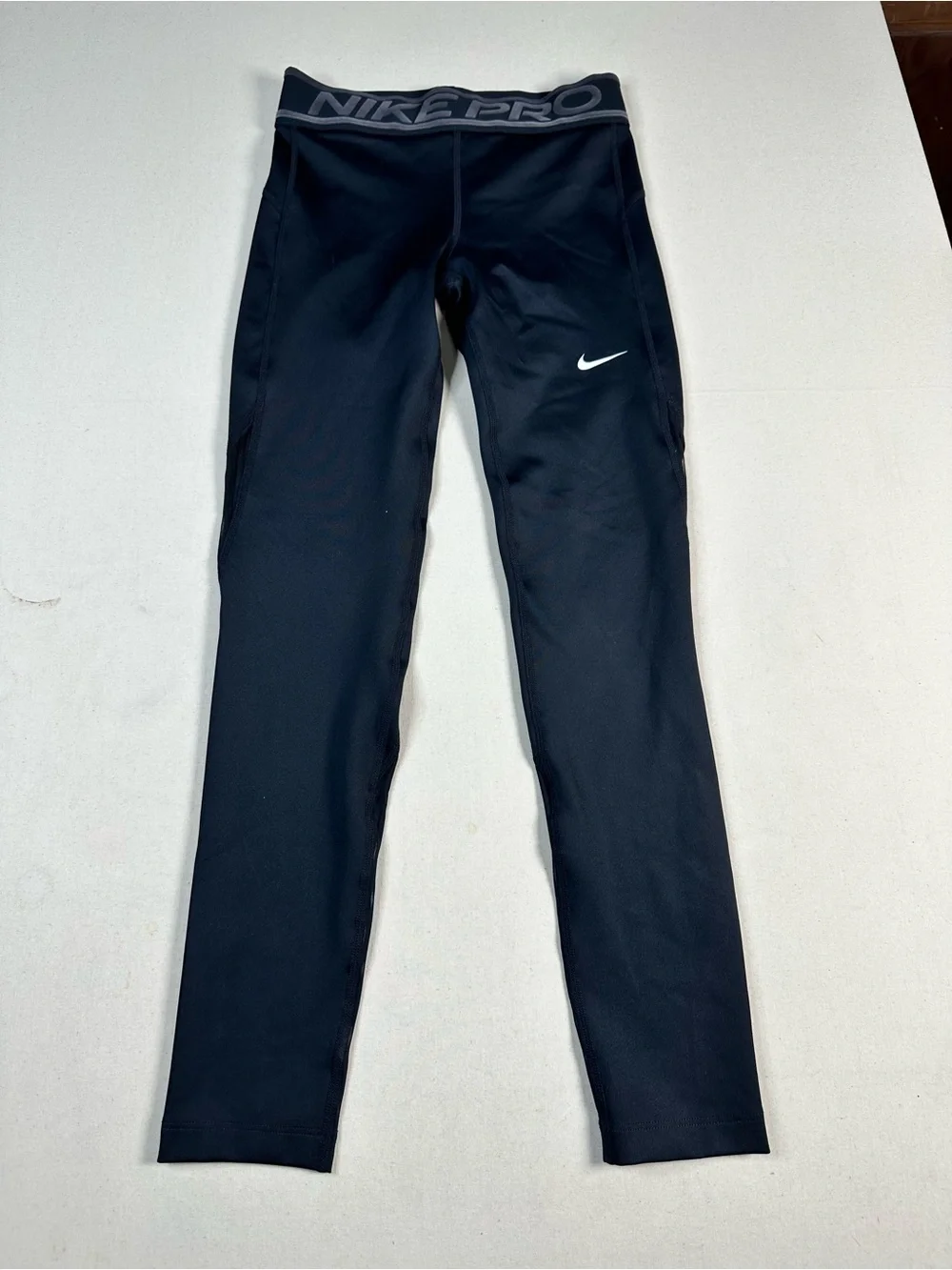 Nike Black Kids Pro Compression Leggings with White Swoosh medium